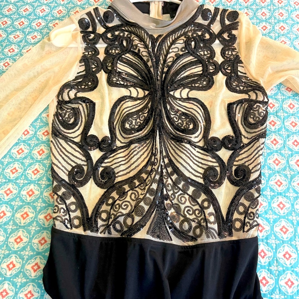 Beige and black body suite. Worn once